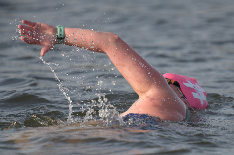 Open water swimming at a TriSwim lake